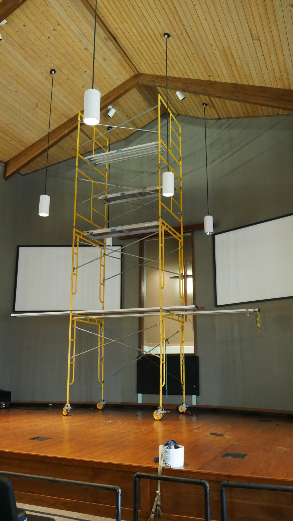 Istrouma Ascension sanctuary at the start of the lighting upgrade — existing wall-wash bars in place, back wall and overhead positions ready for the next layer.